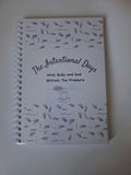 The Intentional Days journal back cover with feature list